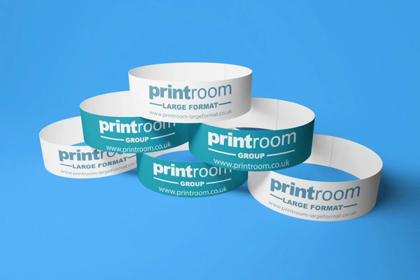  Mockup - Of - A - Pile - Of - Paper - Wristbands - In - A - Simple - Setting - 720 - El (1)